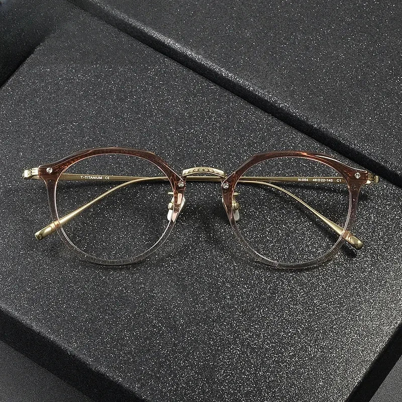 Women's Round Full Rim Titanium Prescription Glasses 34054 — view 1 | Rx Spectacle