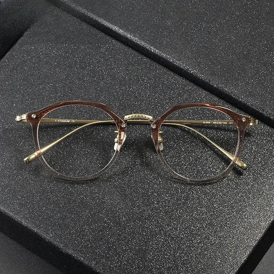 Women's Round Full Rim Titanium Prescription Glasses 34054 — view 1 | Rx Spectacle