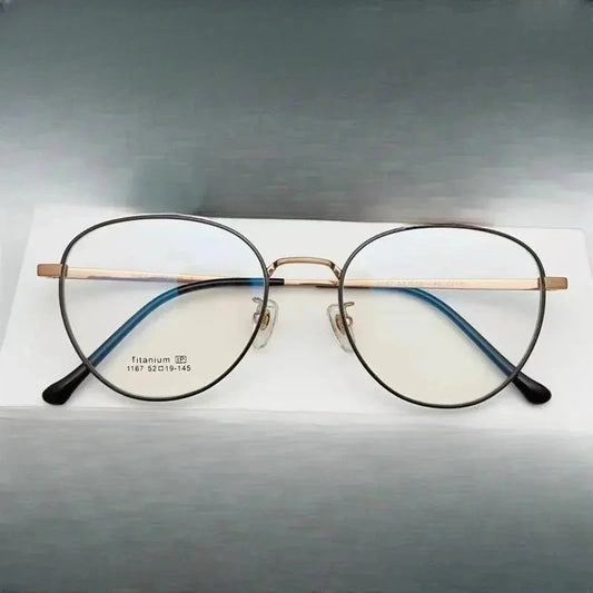 Unisex Oval Full Rim Titanium Prescription Glasses 611167 — view 1 | Rx Spectacle