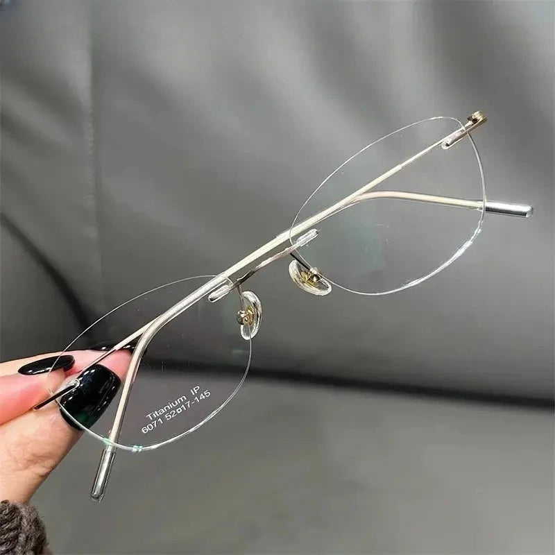 Women's Oval Rimless Titanium Prescription Glasses 696071 — view 4 | Rx Spectacle