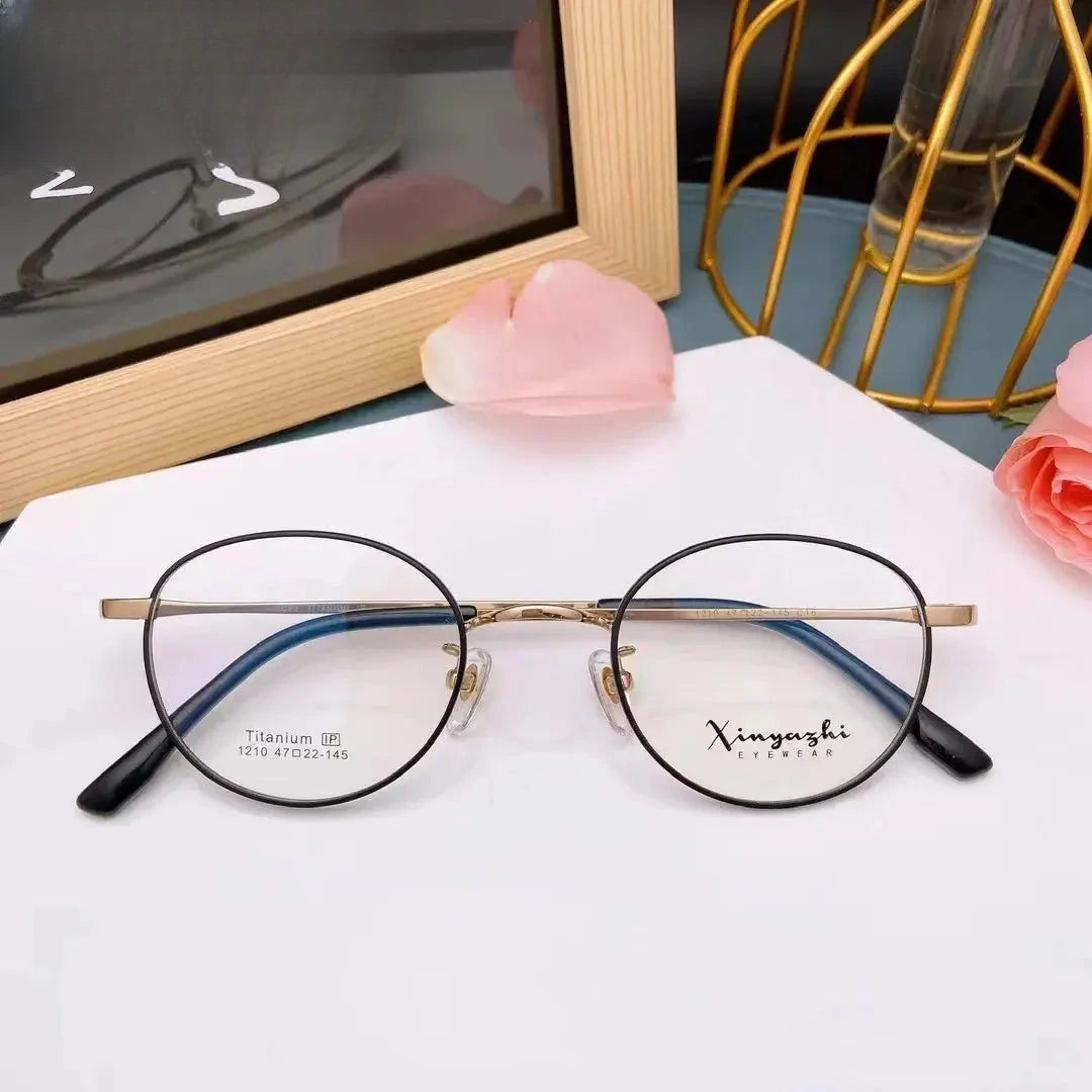 Women's Oval Full Rim Titanium Prescription Glasses 121076 — view 1 | Rx Spectacle