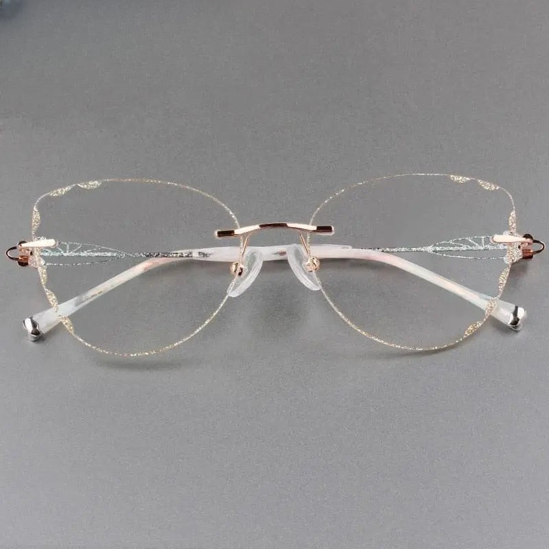 Women's Cat Eye Rimless Titanium Prescription Glasses 88051 — view 1 | Rx Spectacle