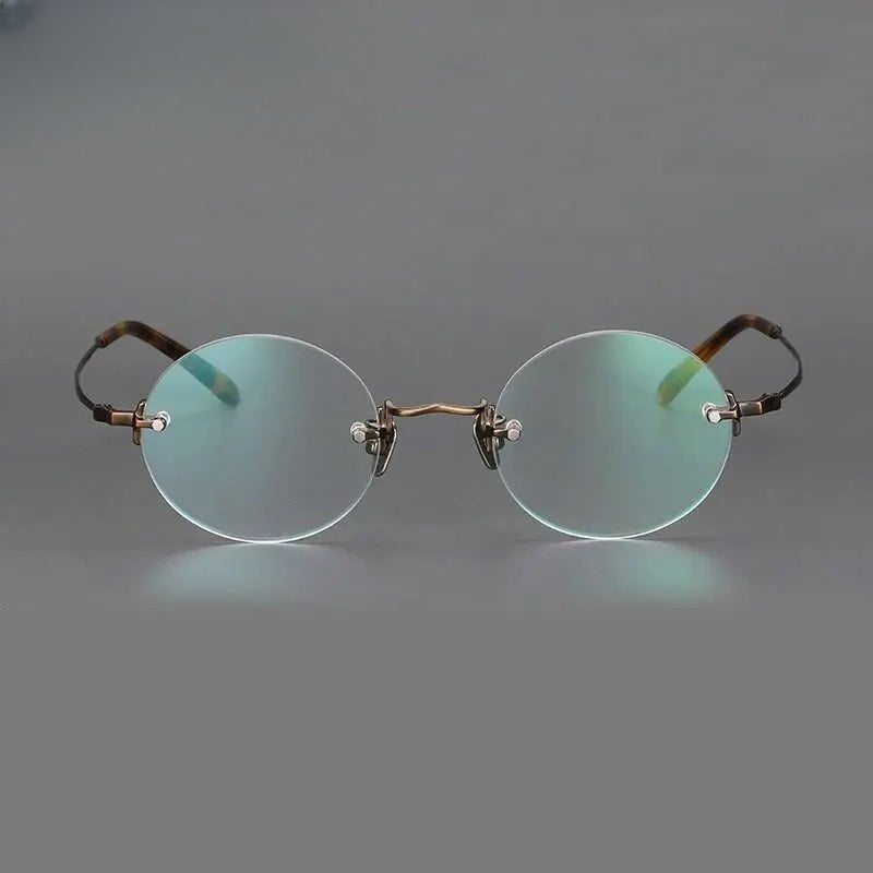 Unisex Round Rimless Titanium Reading Glasses — view 7 | Rx Spectacle