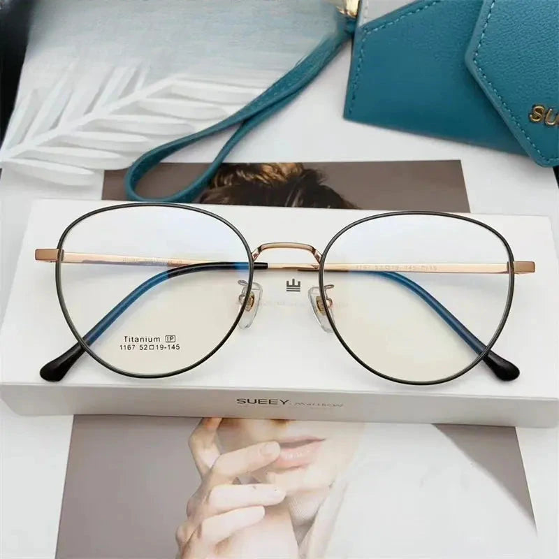 Unisex Oval Full Rim Titanium Prescription Glasses 611167 — view 7 | Rx Spectacle
