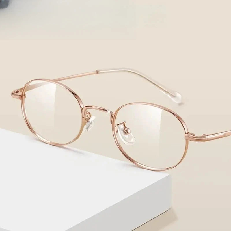 Women's Oval Full Rim Titanium Prescription Glasses 91312 — view 1 | Rx Spectacle