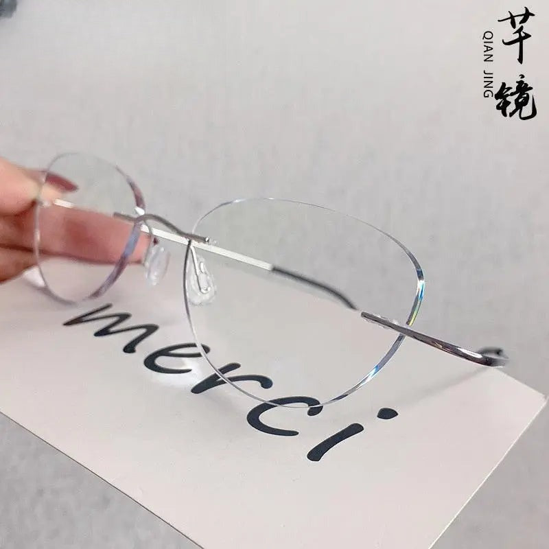 Unisex Cat Eye Rimless Titanium Prescription Glasses 6074-2 — view 1 | Rx Spectacle