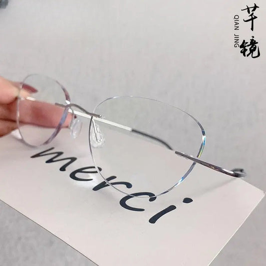 Unisex Cat Eye Rimless Titanium Prescription Glasses 6074-2 — view 1 | Rx Spectacle