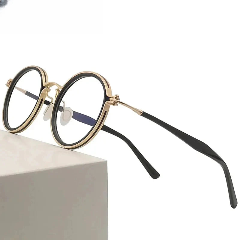 Unisex Round Full Rim Titanium Prescription Glasses 55862 — view 1 | Rx Spectacle