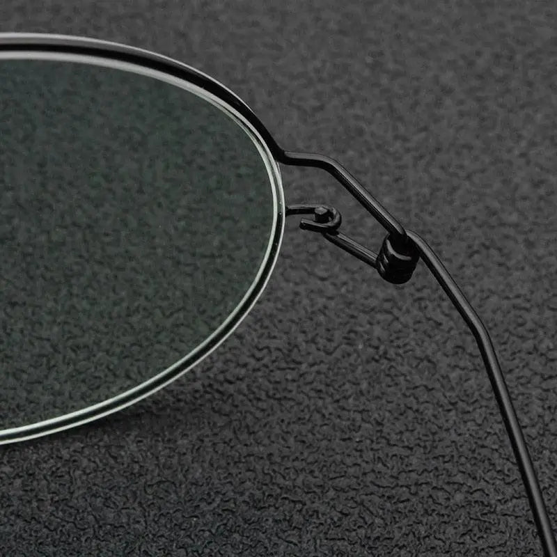 Unisex Round Full Rim Titanium Screwless Prescription Glasses 28607 — view 3 | Rx Spectacle
