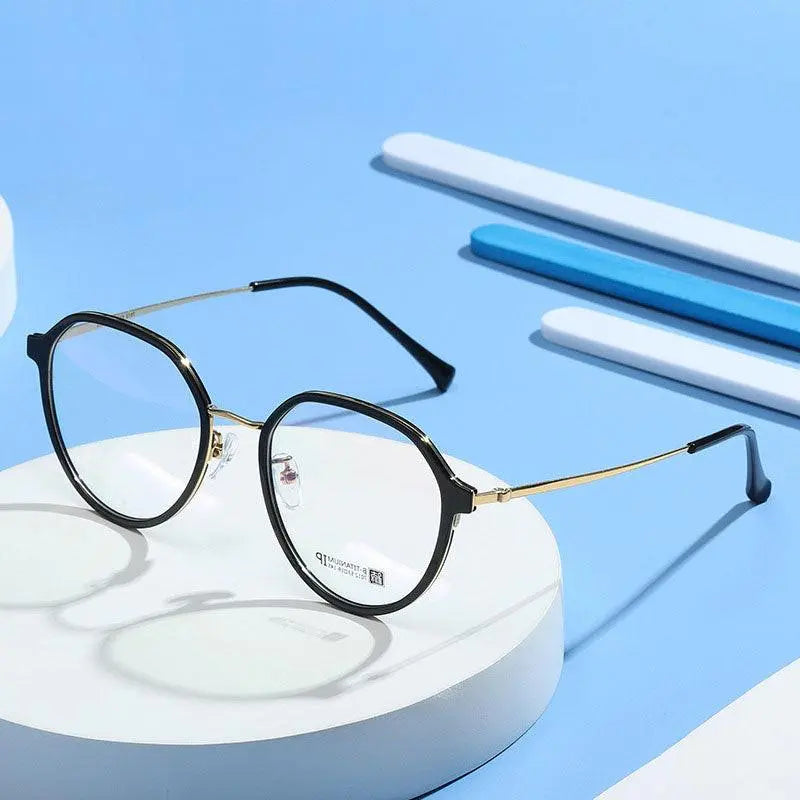 Unisex Round Full Rim Titanium Prescription Glasses 7012 — view 2 | Rx Spectacle