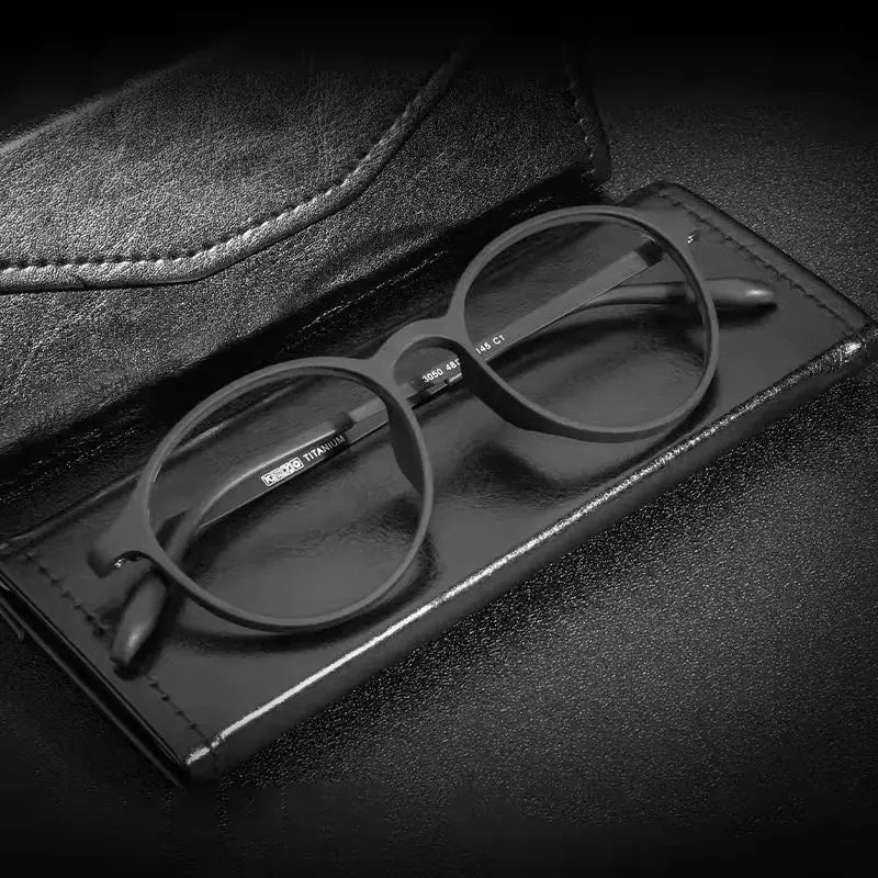 Unisex Round Full Rim Titanium Reading Glasses 9135 — view 1 | Rx Spectacle
