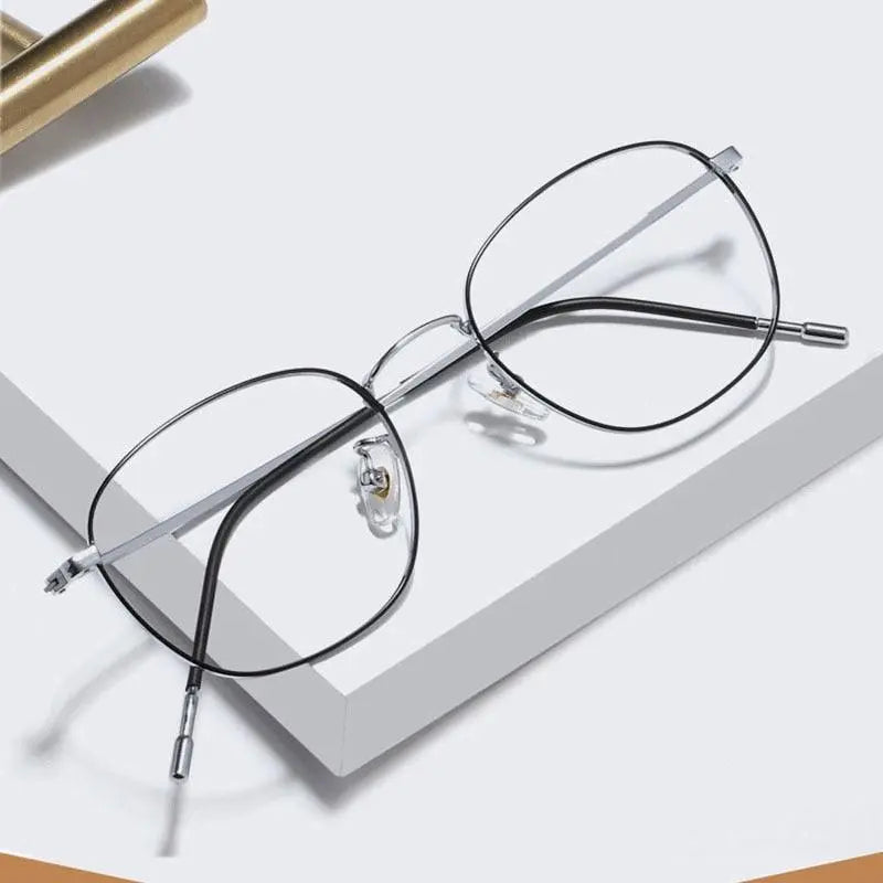 Unisex Round Full Rim Titanium Prescription Glasses 8822x — view 1 | Rx Spectacle