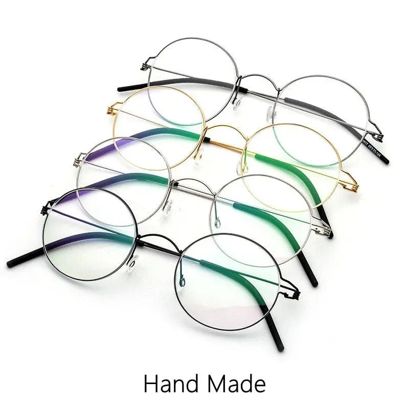 Unisex Round Full Rim Titanium Screwless Prescription Glasses 28607 — view 10 | Rx Spectacle