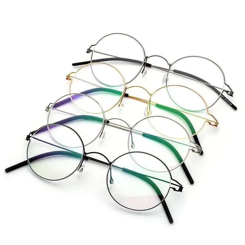Unisex Round Full Rim Titanium Screwless Prescription Glasses 28607 — view 2 | Rx Spectacle