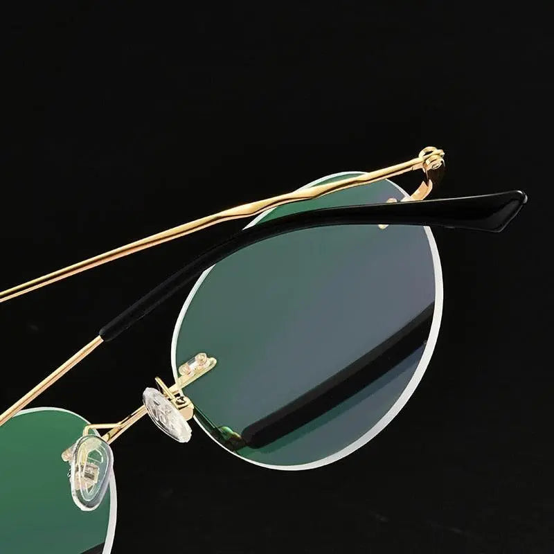 Unisex Round Rimless Titanium Prescription Glasses S7057 — view 4 | Rx Spectacle