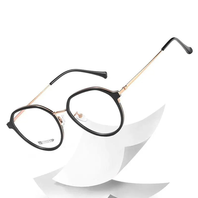 Unisex Round Full Rim Titanium Prescription Glasses 7012 — view 1 | Rx Spectacle