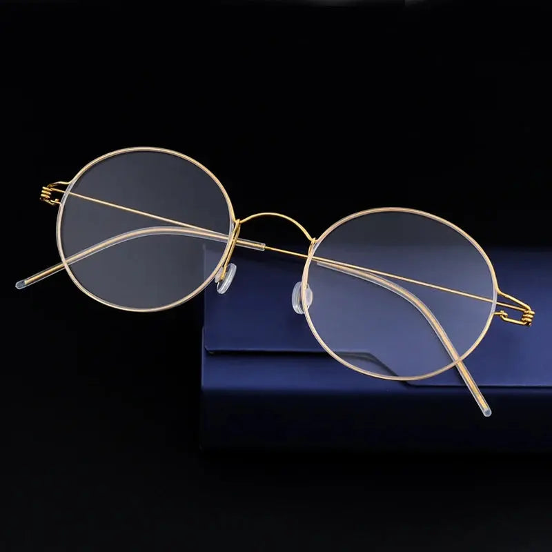 Women's Round Full Rim Titanium Screwless Prescription Glasses 76602 — view 1 | Rx Spectacle