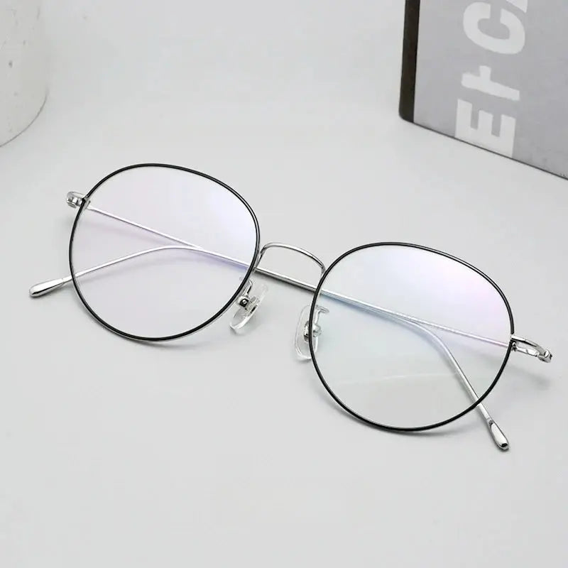 Women's Oval Full Rim Titanium Prescription Glasses 85187 — view 3 | Rx Spectacle