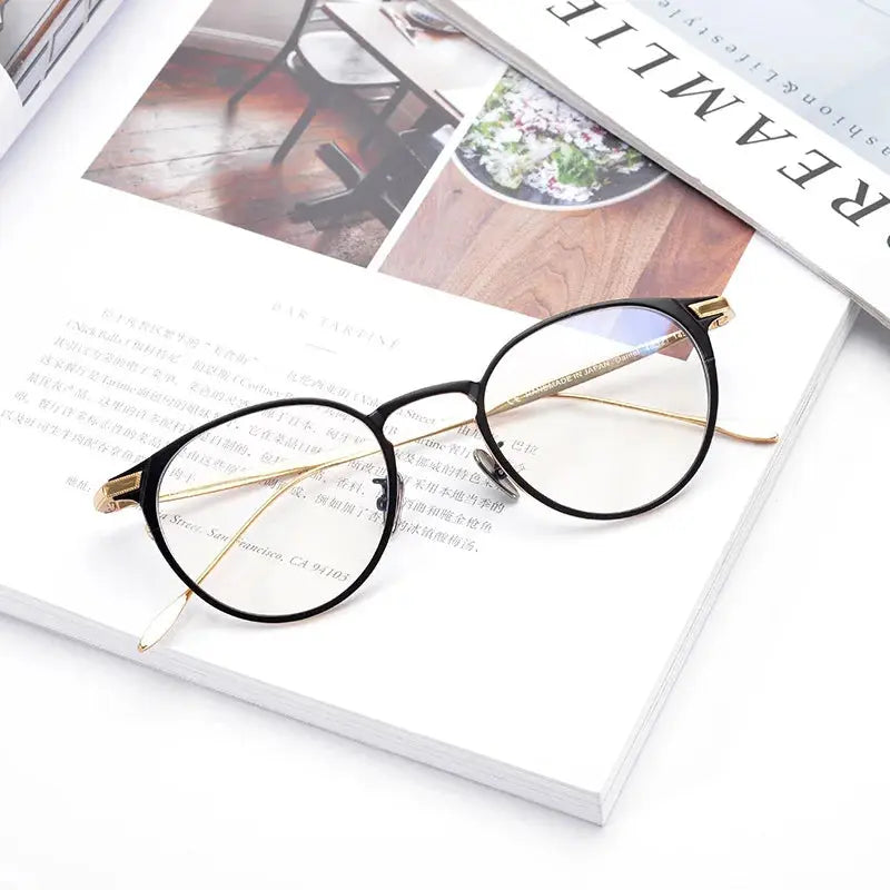 Unisex Oval Full Rim Titanium Prescription Glasses 63061 — view 1 | Rx Spectacle
