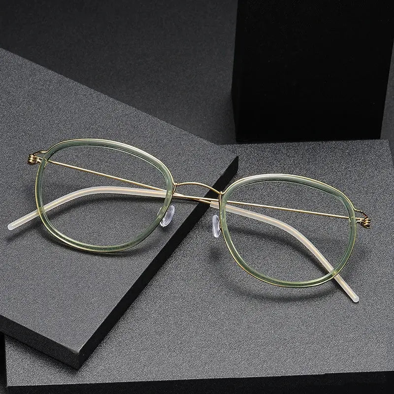 Women's Oval Full Rim Titanium Screwless Prescription Glasses 6611 — view 1 | Rx Spectacle