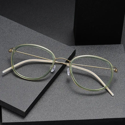 Women's Oval Full Rim Titanium Screwless Prescription Glasses 6611 — view 1 | Rx Spectacle