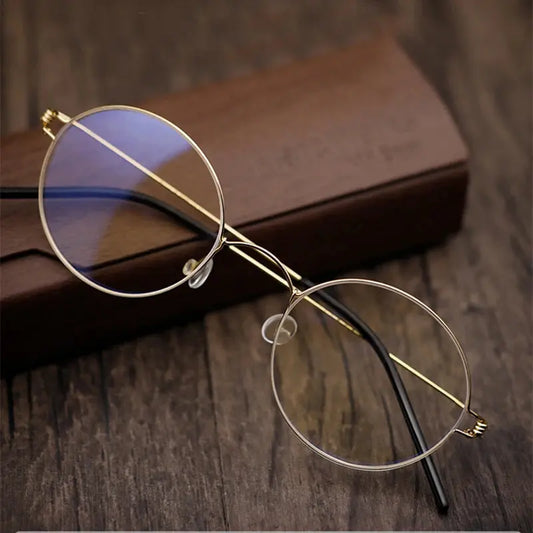 Women's Round Full Rim Titanium Screwless Prescription Glasses 195003 — view 1 | Rx Spectacle