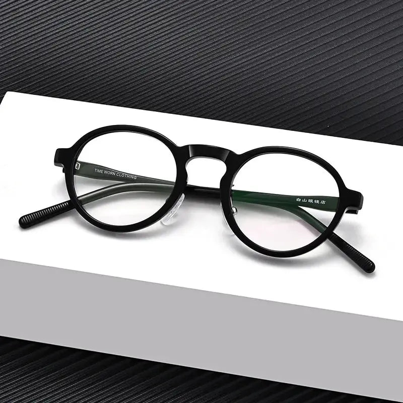 Women's Round Full Rim Titanium Prescription Glasses 366137 — view 1 | Rx Spectacle