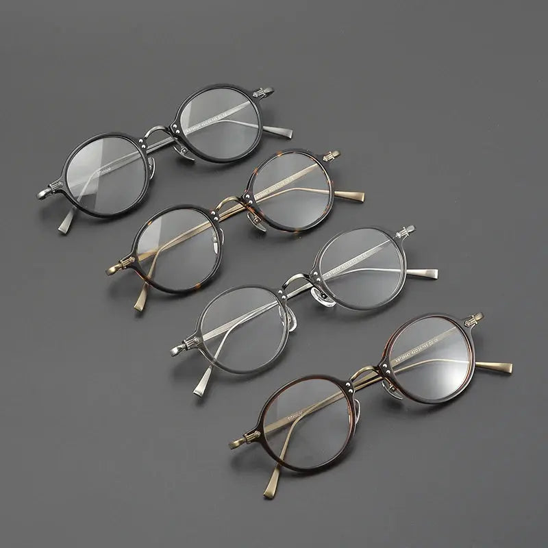 Unisex Round Full Rim Titanium Prescription Glasses 635957 — view 1 | Rx Spectacle