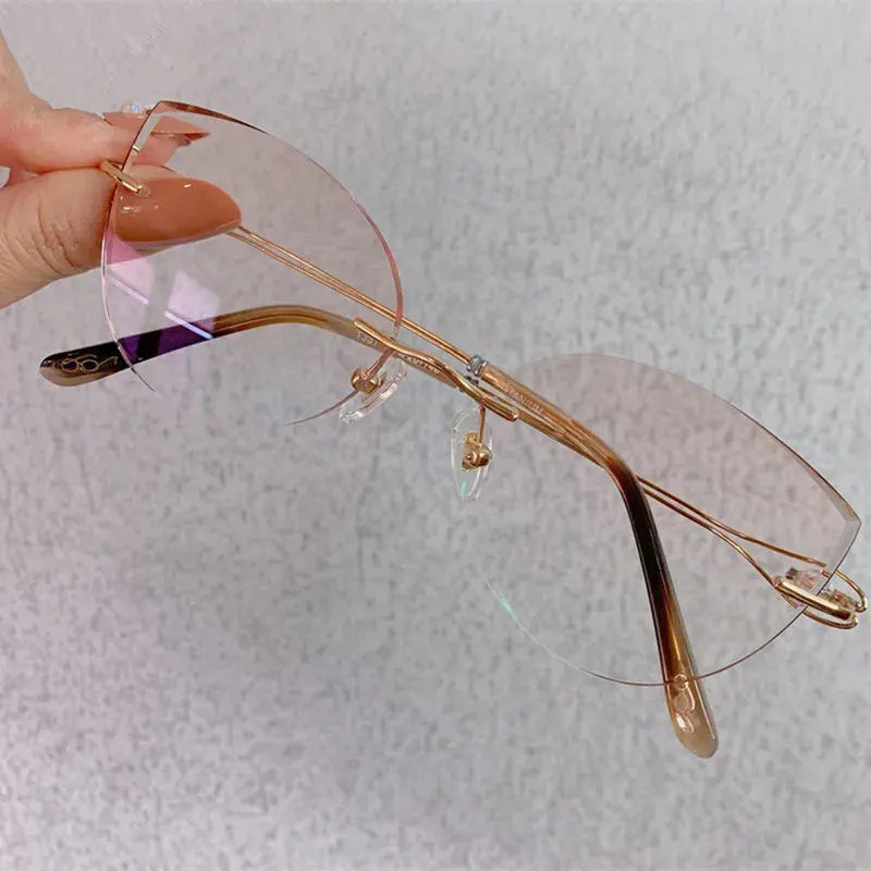 Women's Cat Eye Rimless Titanium Prescription Glasses 1337 — view 2 | Rx Spectacle