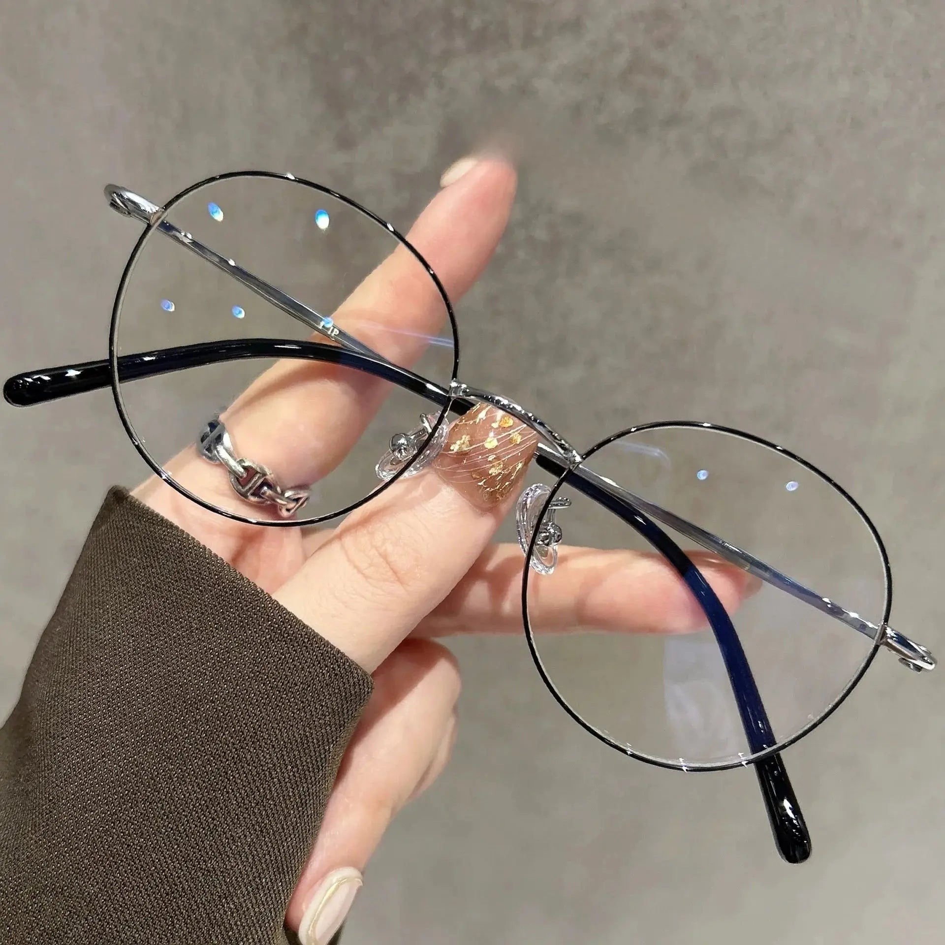 Women's Oval Full Rim Titanium Prescription Glasses 90265 — view 1 | Rx Spectacle