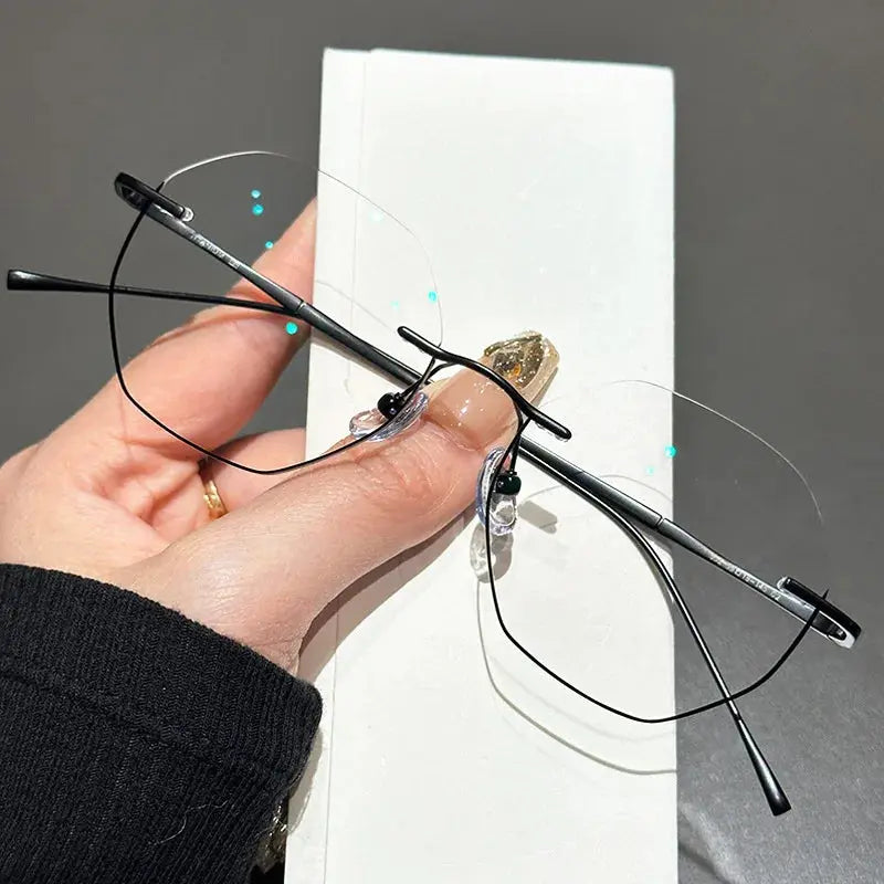 Women's Oval Rimless Titanium Prescription Glasses 63249 — view 2 | Rx Spectacle