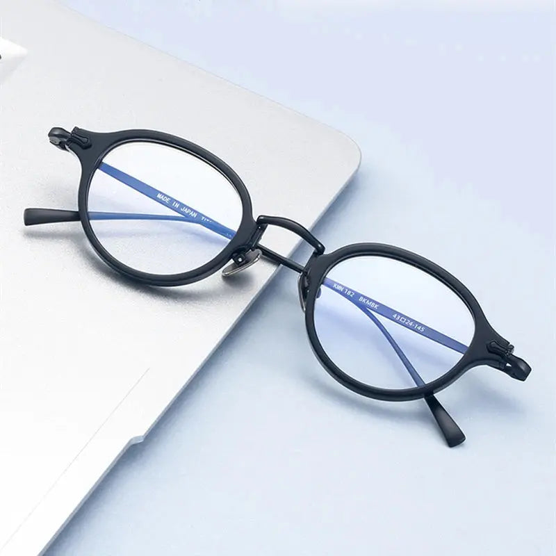 Unisex Round Full Rim Titanium Prescription Glasses 396182 — view 1 | Rx Spectacle