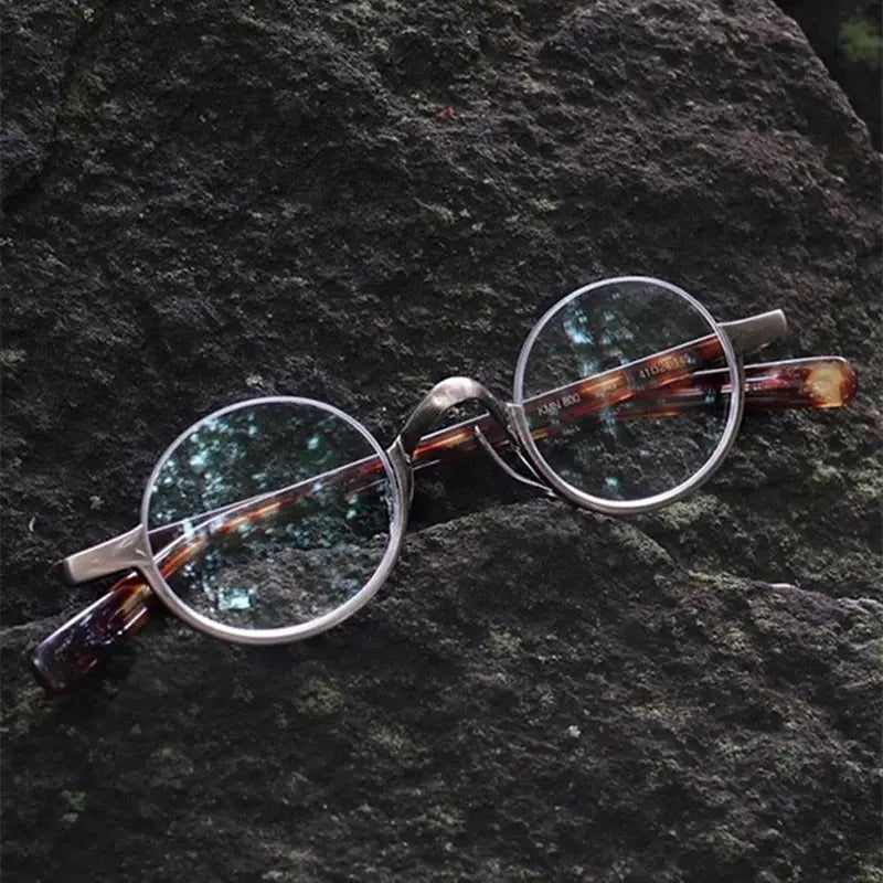 Women's Round Semi-Rimless Titanium Prescription Glasses 366980 — view 1 | Rx Spectacle