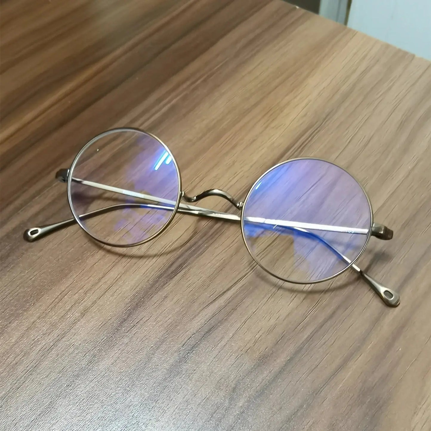 Women's Round Full Rim Titanium Prescription Glasses 285666 — view 1 | Rx Spectacle