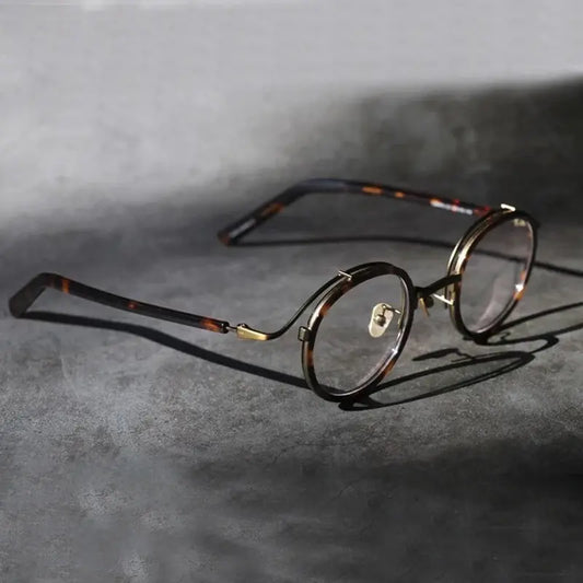 Unisex Round Full Rim Titanium Oversized Prescription Glasses 982027 — view 1 | Rx Spectacle