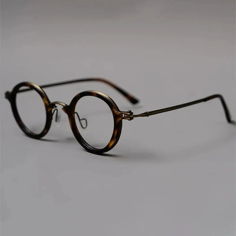 Unisex Round Full Rim Titanium Prescription Glasses 45899 — view 1 | Rx Spectacle
