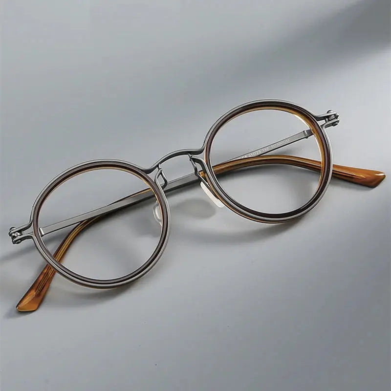 Unisex Round Full Rim Titanium Oversized Prescription Glasses 635860 — view 1 | Rx Spectacle