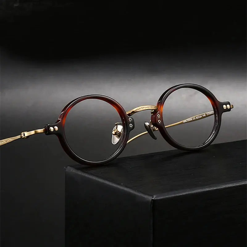 Unisex Round Full Rim Titanium Prescription Glasses 65956 — view 1 | Rx Spectacle