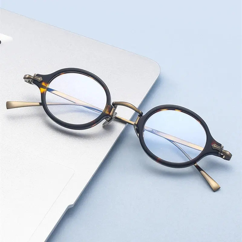 Unisex Oval Full Rim Titanium Prescription Glasses 396181 — view 1 | Rx Spectacle