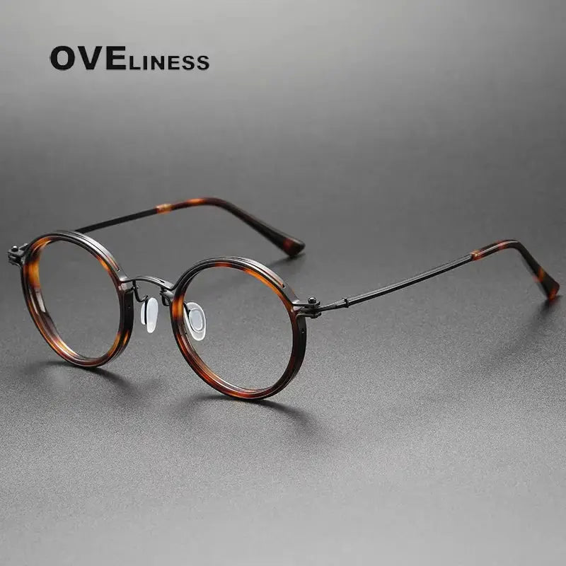Unisex Round Full Rim Titanium Prescription Glasses 25860 — view 3 | Rx Spectacle