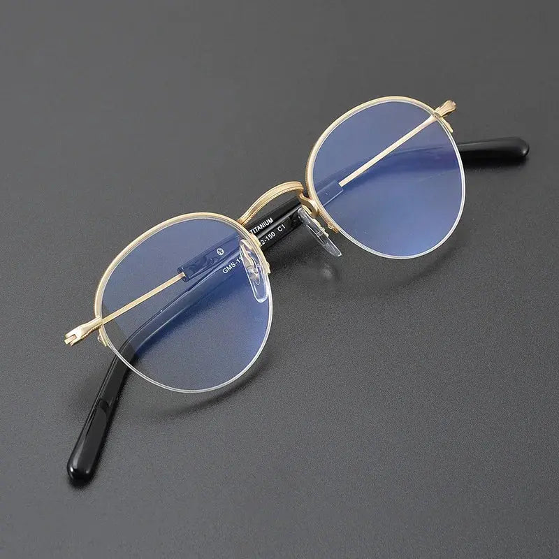 Unisex Oval Semi-Rimless Titanium Prescription Glasses 517110 — view 1 | Rx Spectacle