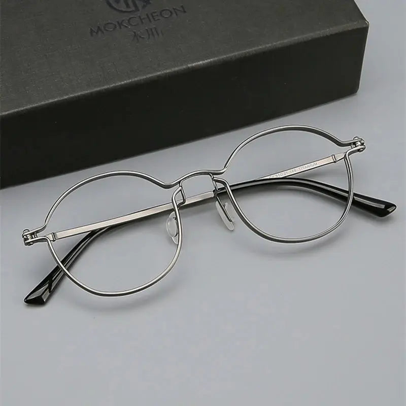 Unisex Oval Full Rim Titanium Prescription Glasses 395897 — view 1 | Rx Spectacle
