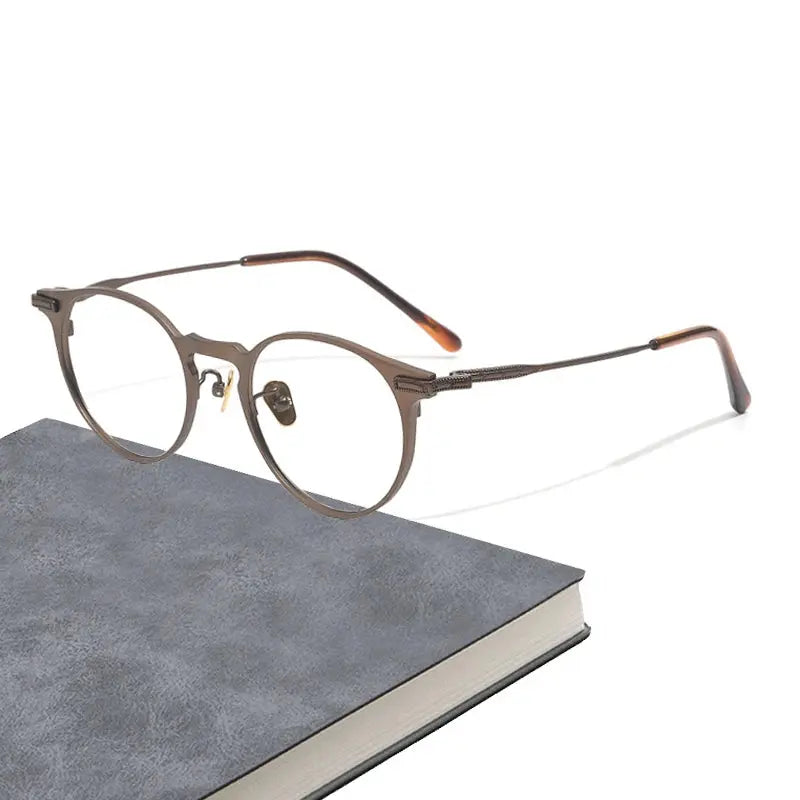 Women's Oval Full Rim Titanium Prescription Glasses 99016 — view 1 | Rx Spectacle