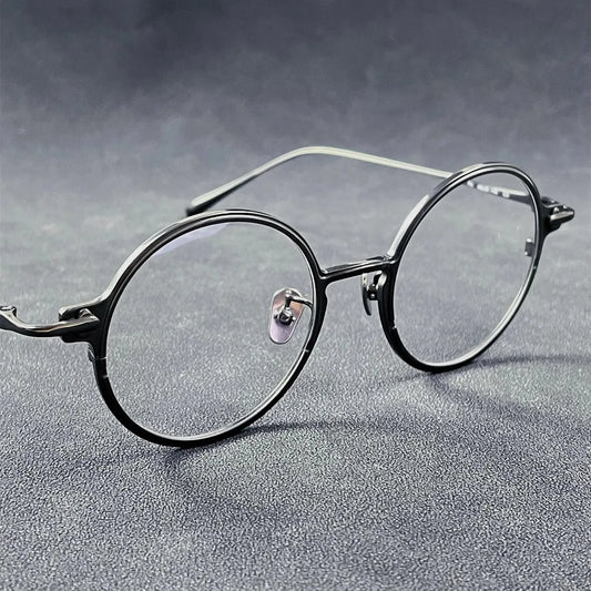Unisex Round Full Rim Titanium Prescription Glasses 634142 — view 1 | Rx Spectacle