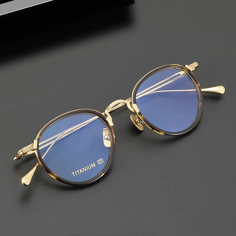 Unisex Oval Full Rim Titanium Prescription Glasses E046 — view 1 | Rx Spectacle