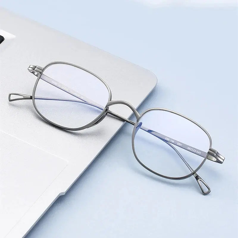 Unisex Round Full Rim Titanium Prescription Glasses 844144 — view 1 | Rx Spectacle