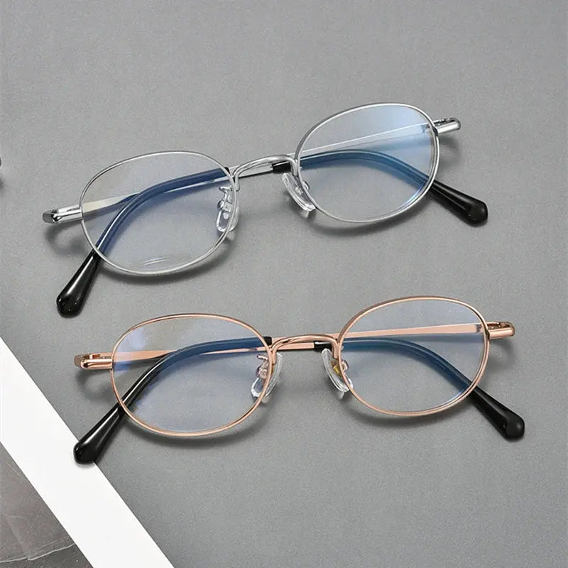 Women's Oval Full Rim Titanium Prescription Glasses 744480 — view 1 | Rx Spectacle