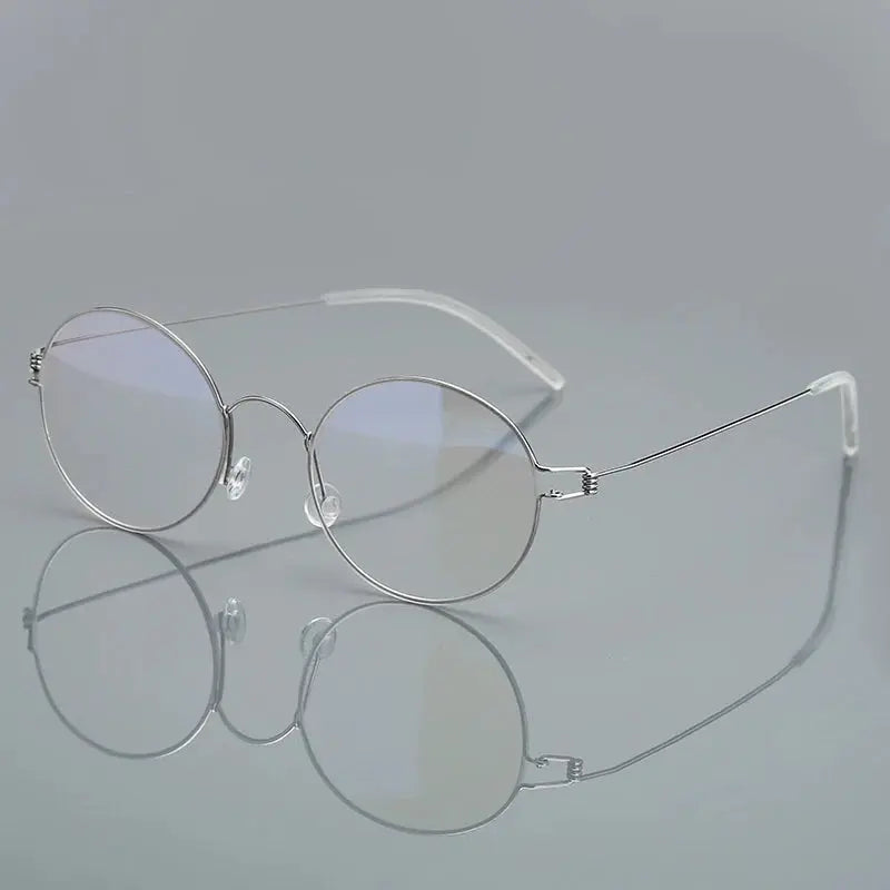 Women's Round Full Rim Titanium Screwless Prescription Glasses 76602 — view 5 | Rx Spectacle