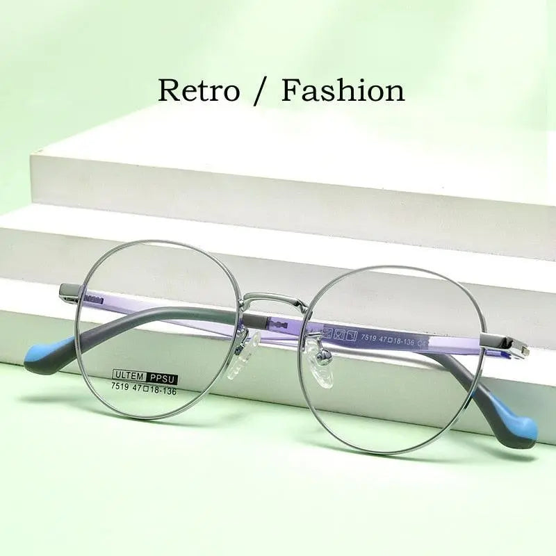 Unisex Round Full Rim Titanium Prescription Glasses 7519S — view 6 | Rx Spectacle