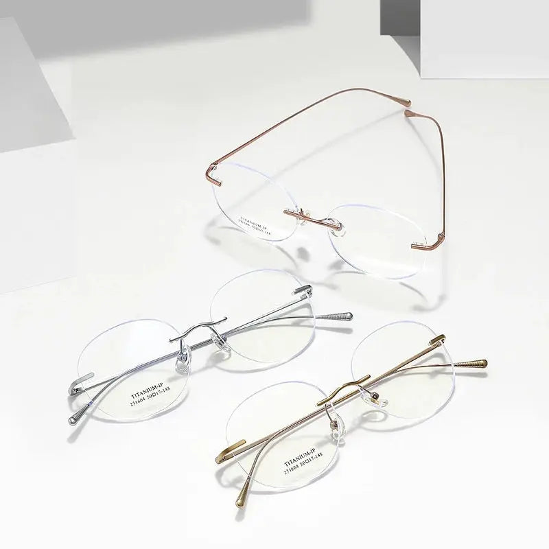 Unisex Round Rimless Titanium Prescription Glasses 231604Wk — view 2 | Rx Spectacle